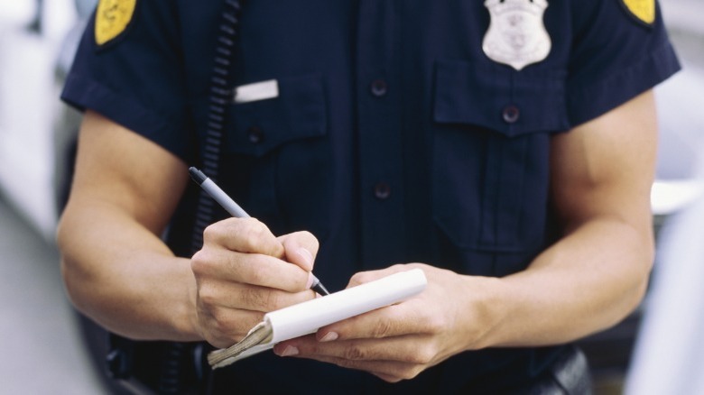 police officer taking notes