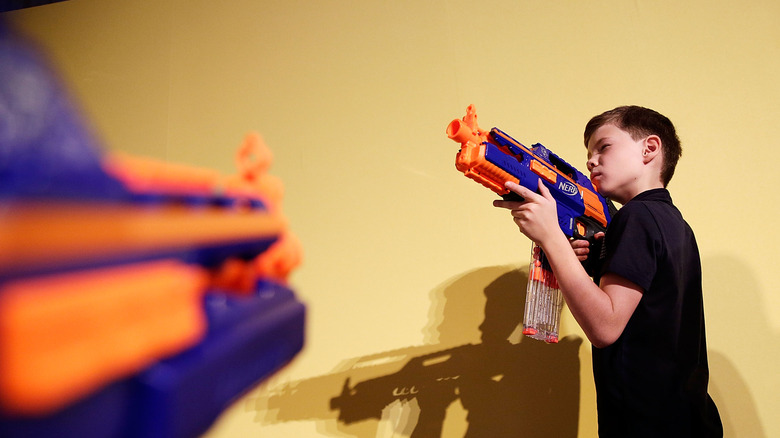 Kid with Nerf gun