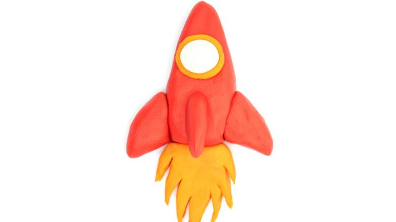 Play-Doh rocket on white background