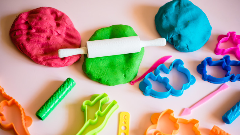 Colorful clay and accessories on a table