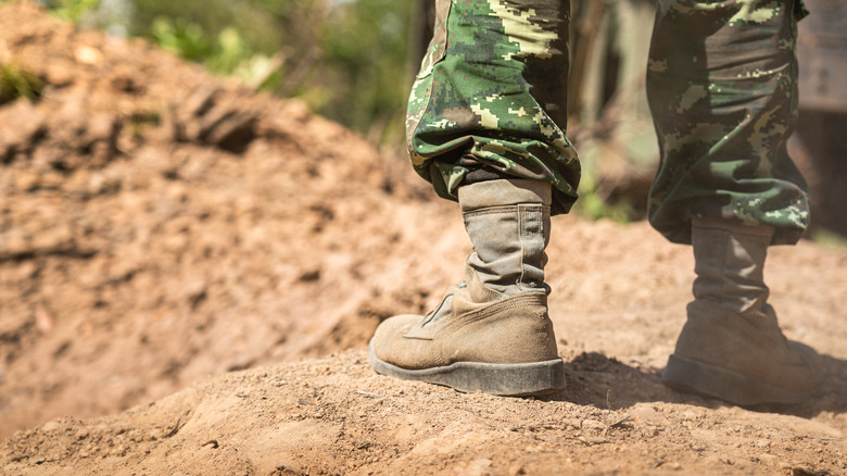a soldier's boots on the ground