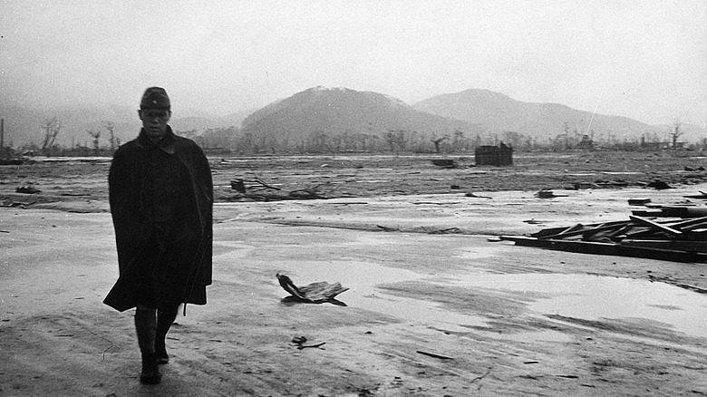 a soldier walking through what was hiroshima