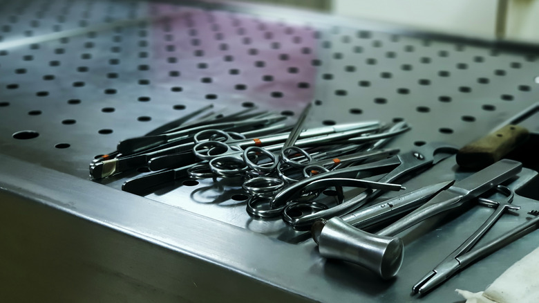 autopsy tools on metal table