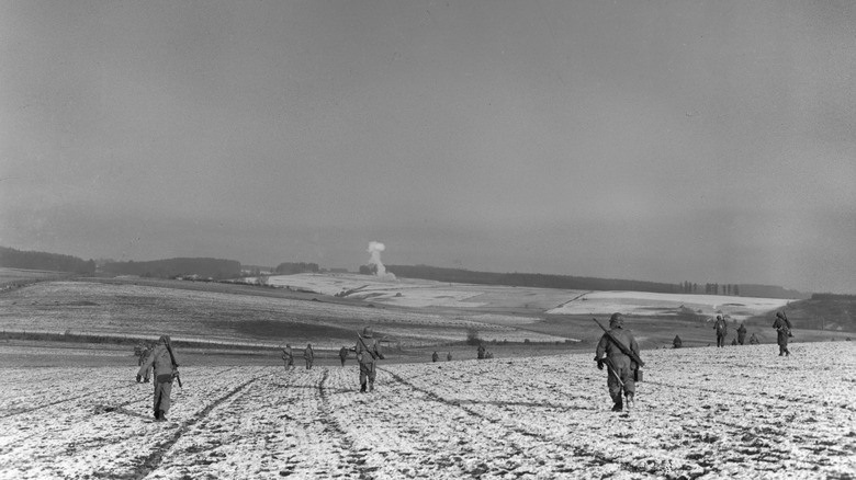 American troops walking across Belgium