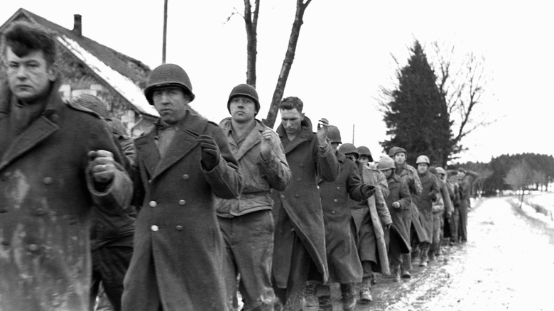 American POWs marching