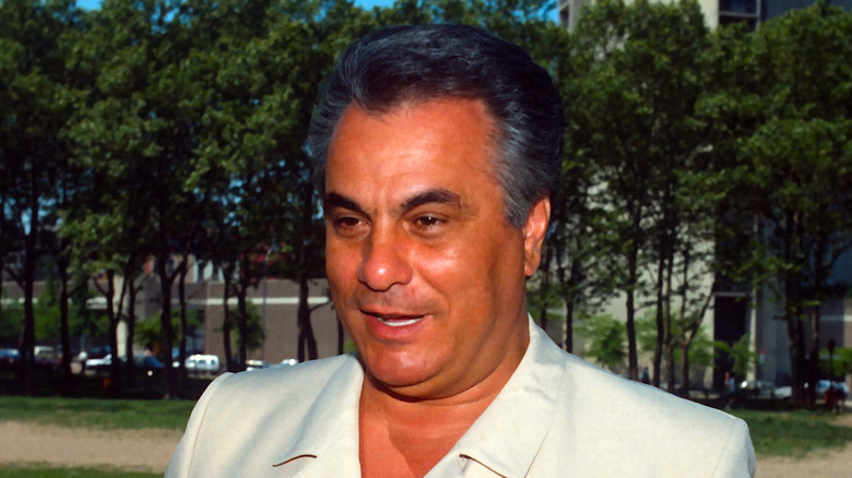 John Gotti outside smiling white shirt