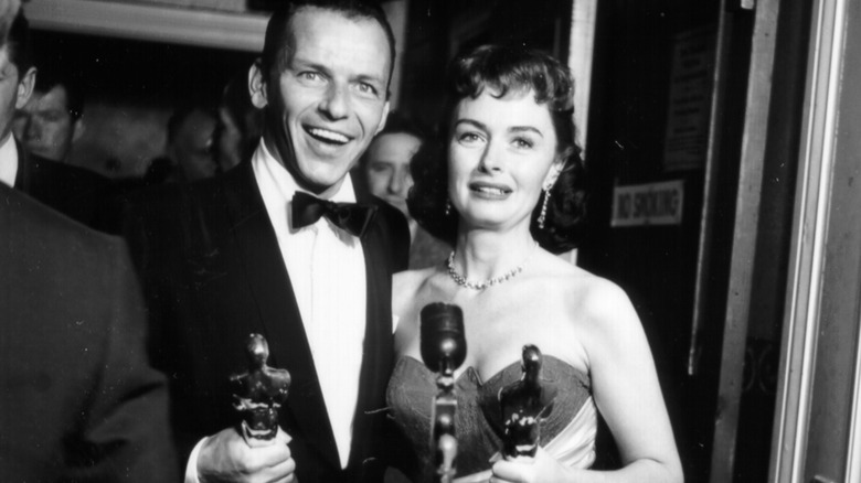 Donna Reed and Frank Sinatra holding Oscars
