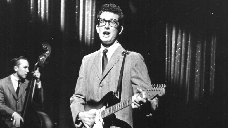 Buddy Holly playing guitar onstage