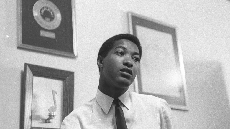 Sam Cooke shirt tie awards behind on wall