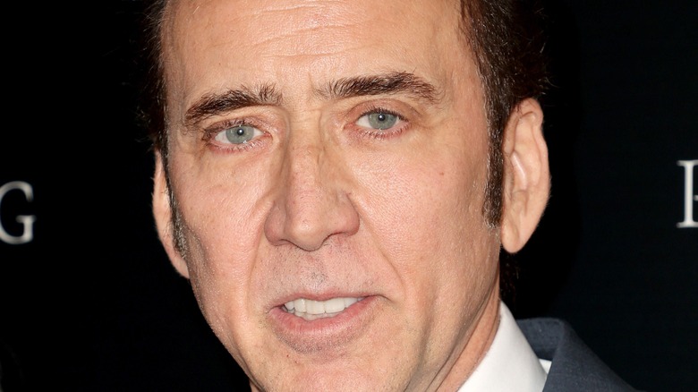 Nicholas Cage looking at camera