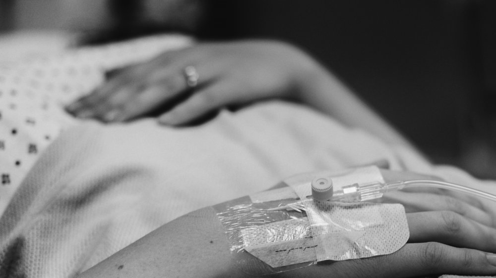 Woman in hospital bed