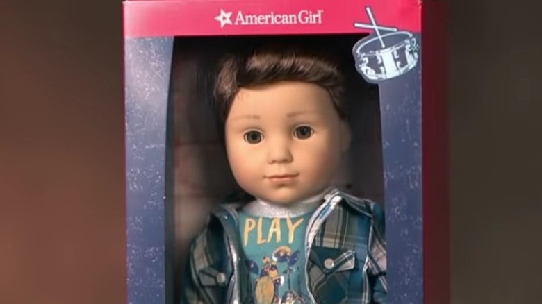 American Girl doll Logan in his box