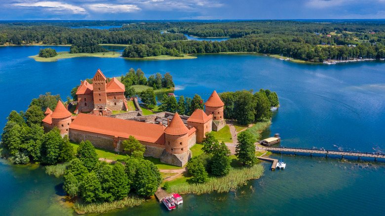 Trakai castle surrounded by blue water