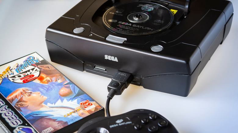 Sega Saturn with controller and game