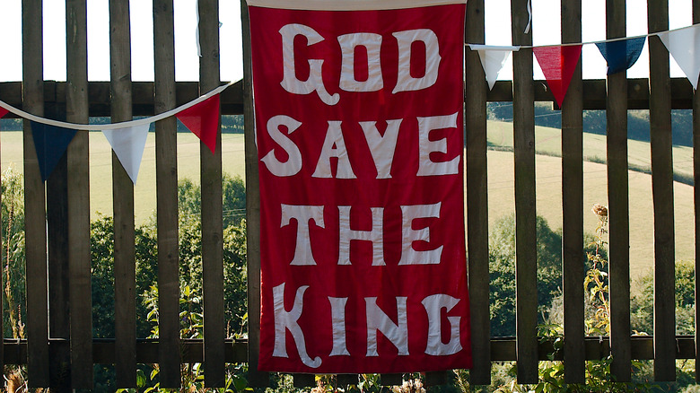 Signage reading 'God save the King'