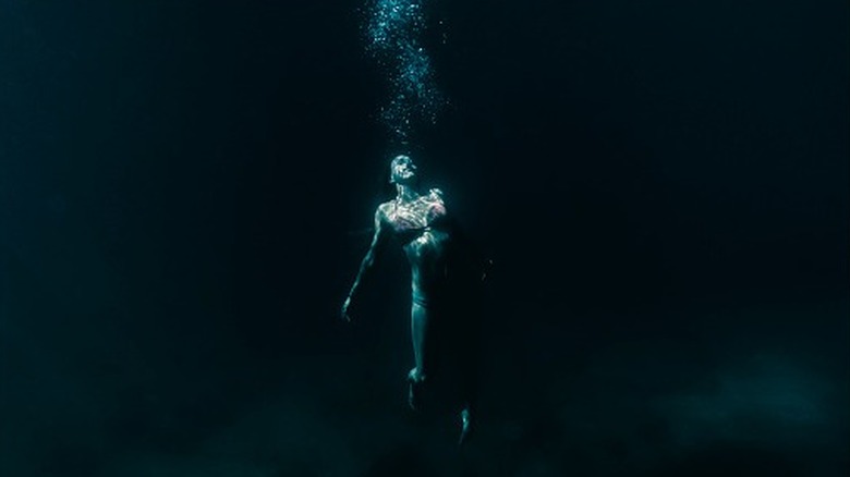 Body floating underwater