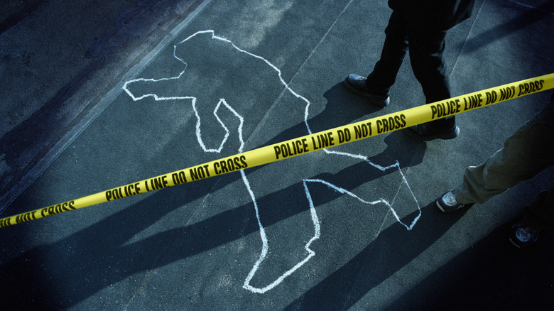 Body outline at crime scene