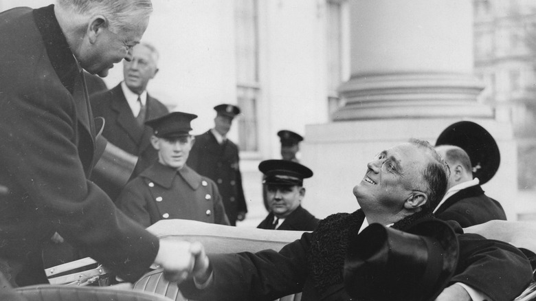 Hoover shakes FDR's hand