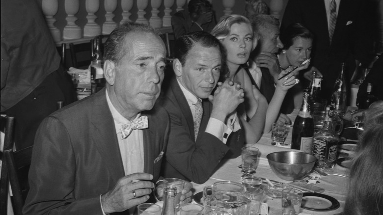 Bogart with friend Frank Sinatra at the bar