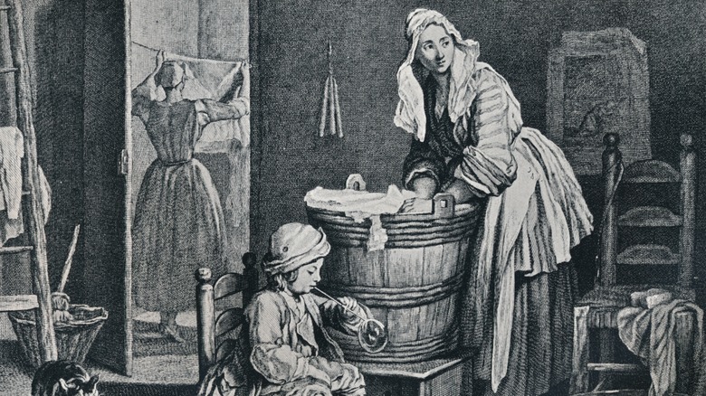Drawing of an 18th century maid washing linen in a wooden washtub