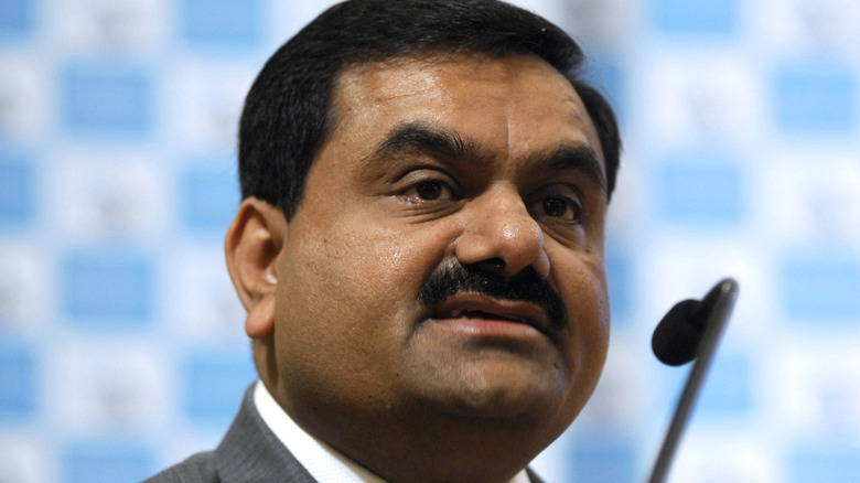 Gautam Adani at a microphone