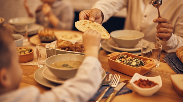 Muslim family eating food