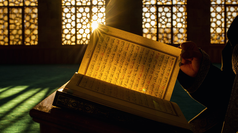 Open Quran in Mosque in sunlight