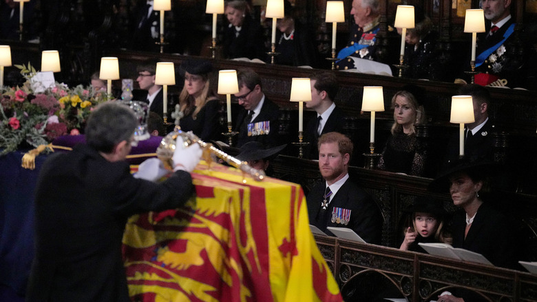 removal of crown from Queen Elizabeth's casket 