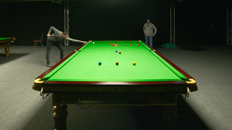 men playing snooker