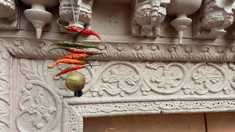 Buri Nazar hanging on above door