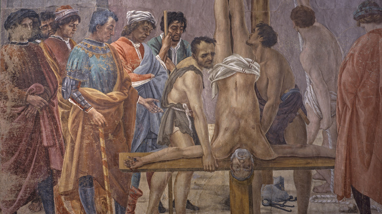 Artwork depicting St. Peter being crucified