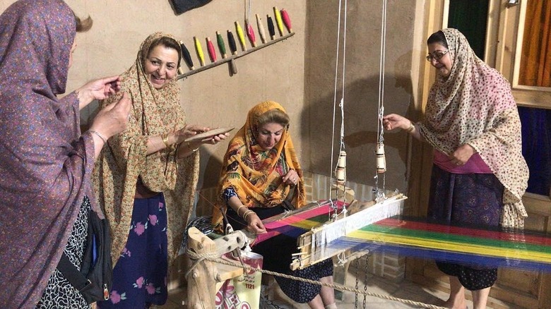 Zoroastrian women weaving