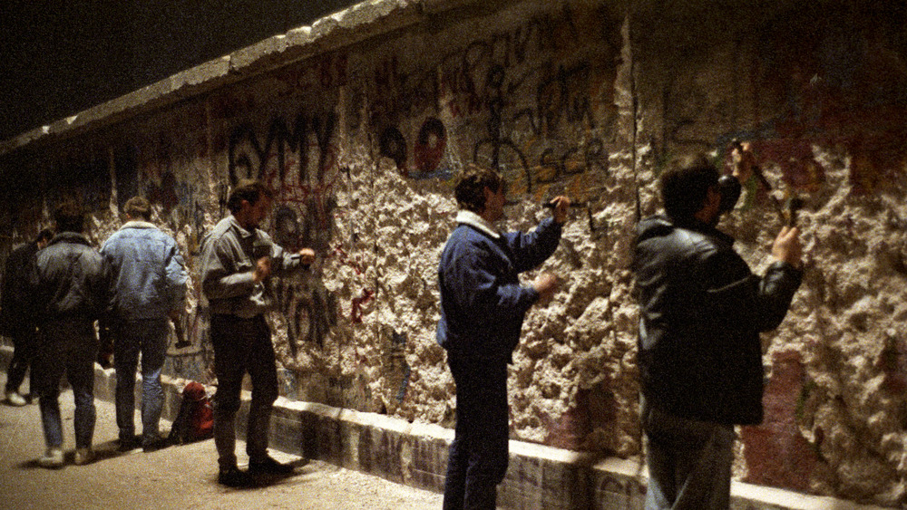 "Woodpeckers" chipping away at the Berlin Wall
