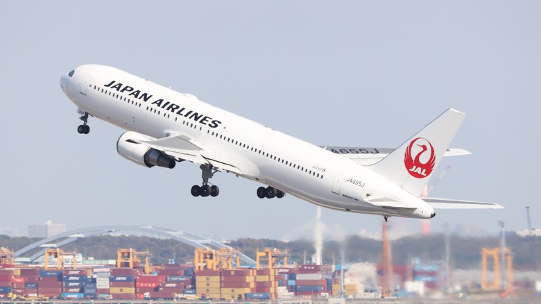japan airlines plane in sky