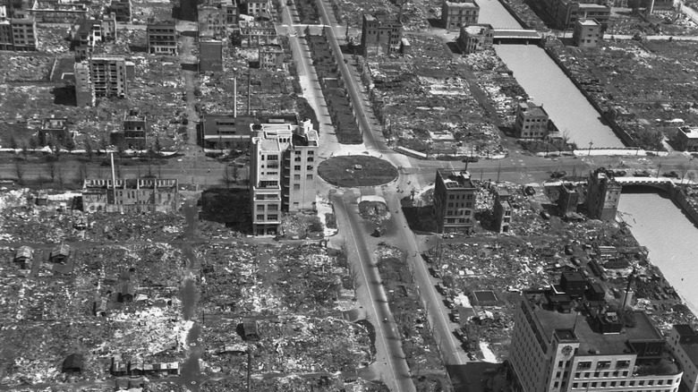 Aerial view of downtown Tokyo with many structures damaged by bombing, 1945