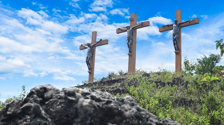 Golgotha Hill three crosses statues