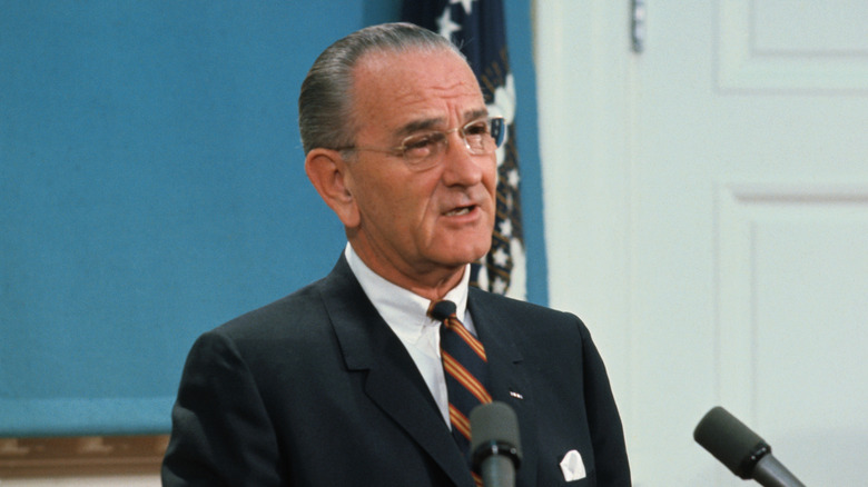 President Johnson speaking on podium