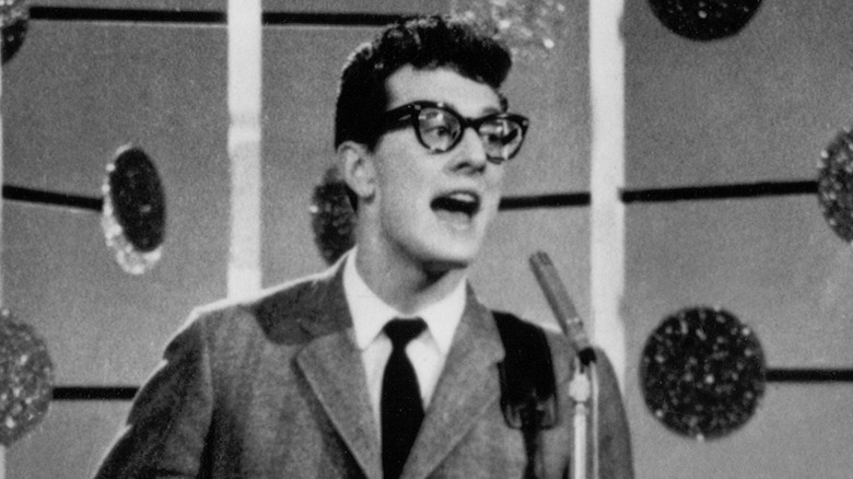 Buddy Holly singing in microphone