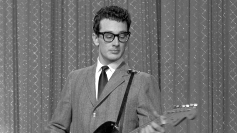 Buddy Holly playing guitar