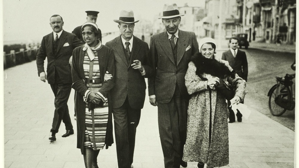 Josephine Baker walking with people 