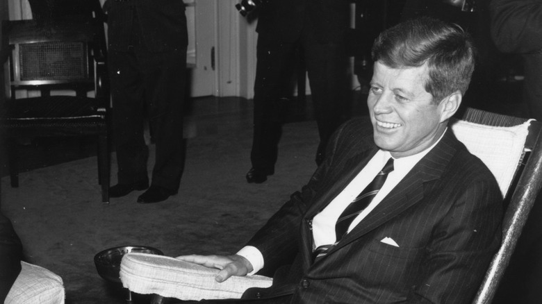 John F. Kennedy in chair