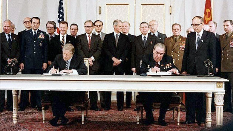 carter and brezhnev sat table signing treaty