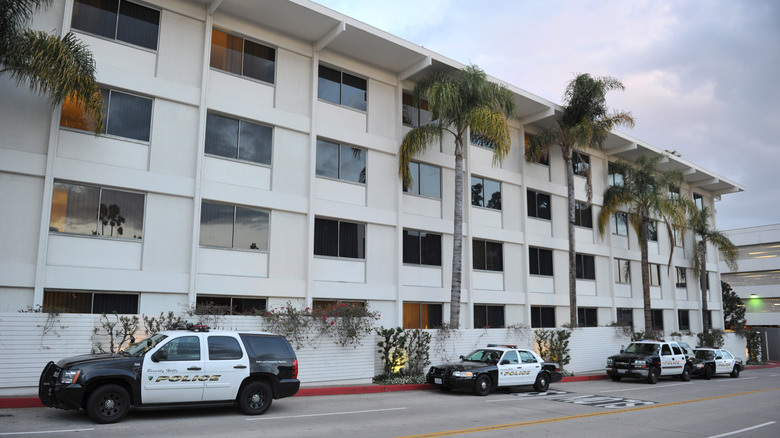 Police cars in front of the Beverly Hilton Hotel