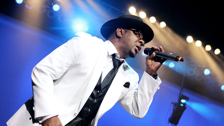 Bobby Brown performing with New Edition