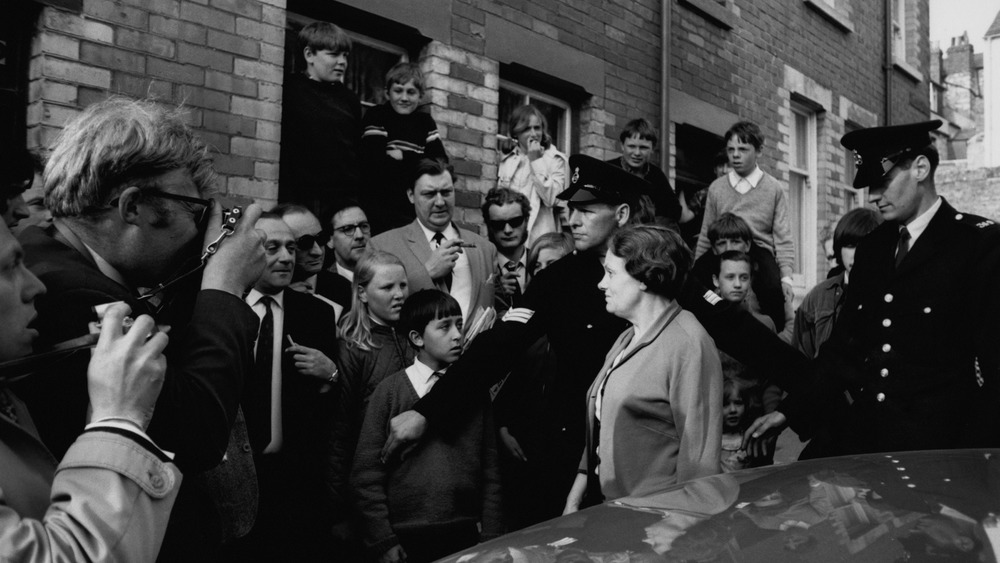 Ethel Gee returns to her home surrounded by crowd