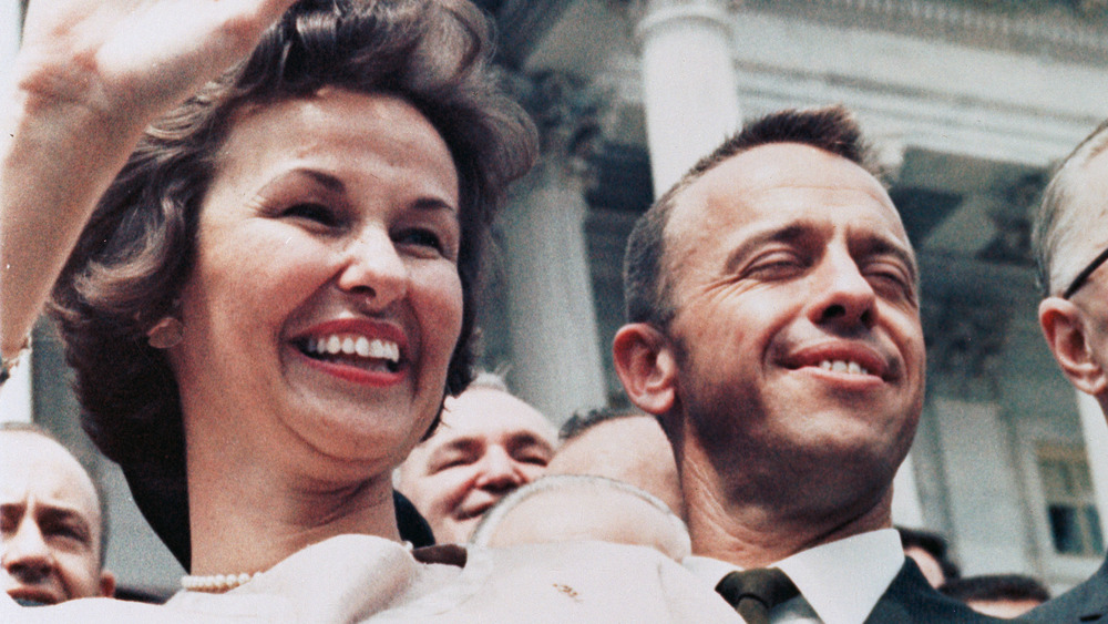 Louise and Alan Shepard waving to a crowd 