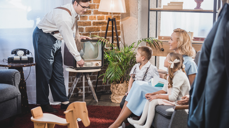 1960s family watching TV