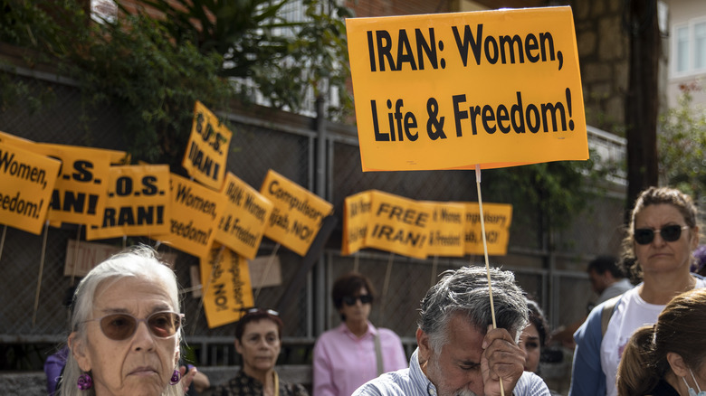 Demonstrators in Spain protesting for Iranian women's rights