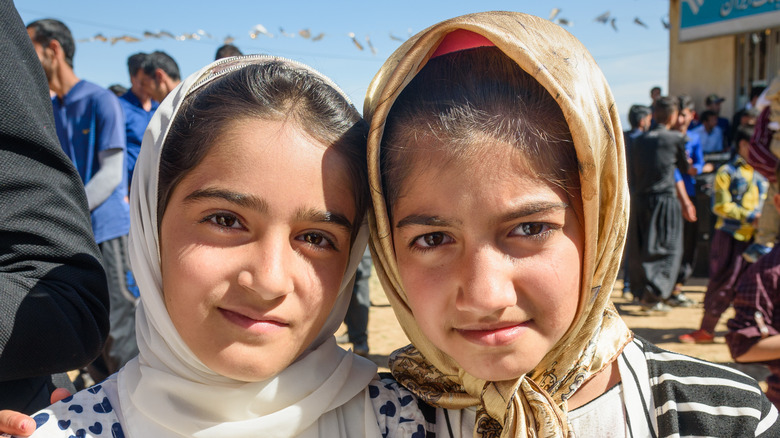 Young Iranian girls smiling