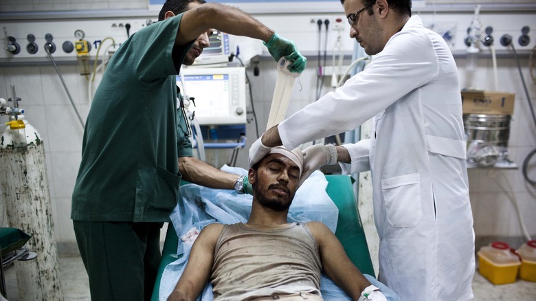 doctors with patient in libya